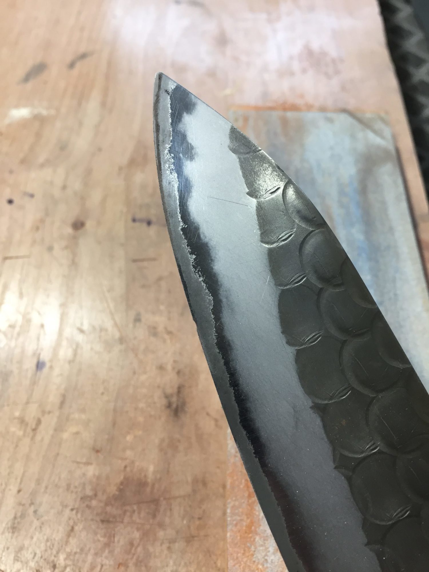 grinding out a chip in chef knife